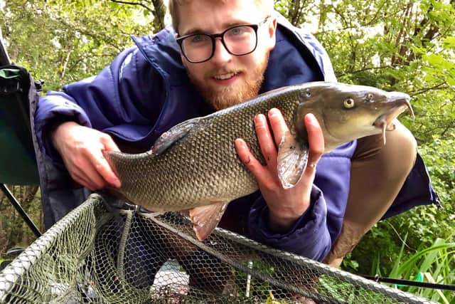 Eliburn day ticket angler Fraser Moran with 6lb barbel