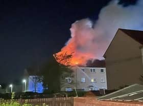 Six people were taken to hospital after a fire broke out in top story flat in Loanhead.