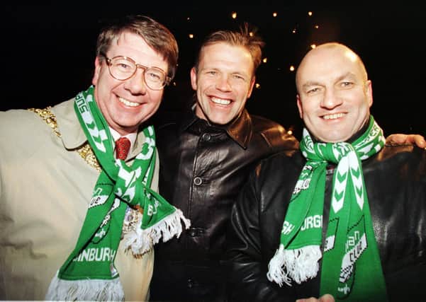 John Hughes with Eric Milligan and Steve wearing Hibs scarves (Picture: Jeremy Stockton)