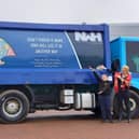 Euan Kennedy from Stobhill Primary and his teacher Donna Hanley see his artwork on the side of the NWH Group truck