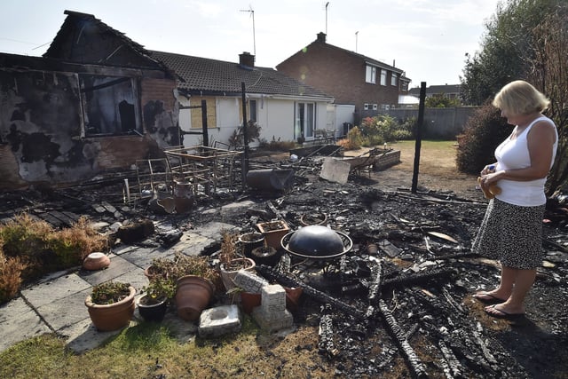 Bungalow fire at Beech Close, Market Deeping. Dave Turner  and Olwyn Cornwell amongst the remains of their home. EMN-201208-122132009