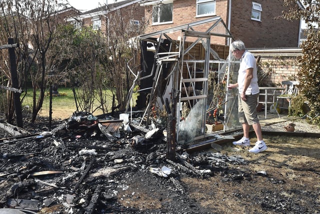 Bungalow fire at Beech Close, Market Deeping. Dave Turner  and Olwyn Cornwell amongst the remains of their home. EMN-201208-121924009