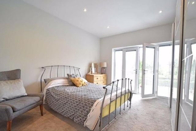 A large double room with french door and a Juliet balcony overlooking the back garden. There is a walk in cupboard with hanging space and shoe racks.