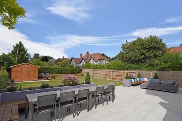 The rear garden has a paved terrace consisting of permanent planters, two seating areas and a gas fired fire pit with external solar powered lighting, water and power points. The terrace leads down to the lawn where there is also an additional timber sundeck and a larger timber garden shed.