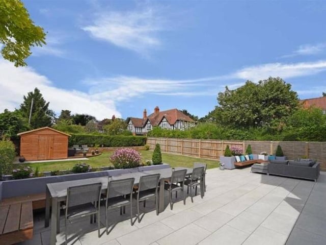The rear garden has a paved terrace consisting of permanent planters, two seating areas and a gas fired fire pit with external solar powered lighting, water and power points. The terrace leads down to the lawn where there is also an additional timber sundeck and a larger timber garden shed.