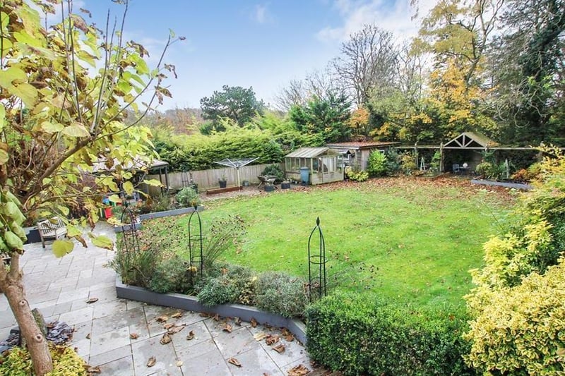 Another angle of the rear garden showing just how big the area is and the other features prospective owners would inherit
