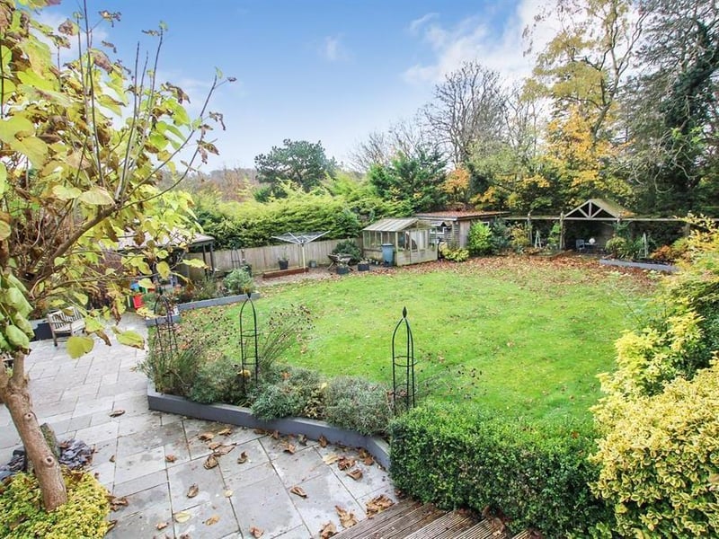 Another angle of the rear garden showing just how big the area is and the other features prospective owners would inherit