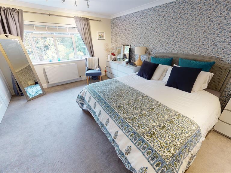 One of four double bedrooms on the property