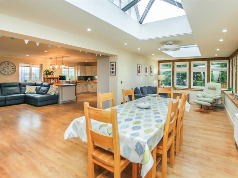 The ground floor dining situated across from the kitchen and lounge area