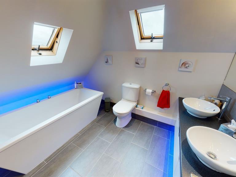One of four bathrooms on the property