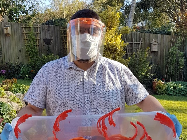 Rik Tooley, a lecturer at Chichester College, makes visors for NHS workers