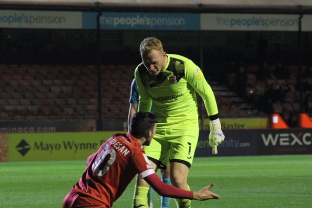Cameron Dawson has a go at Nadesan after the 'dive' that saw him sent off