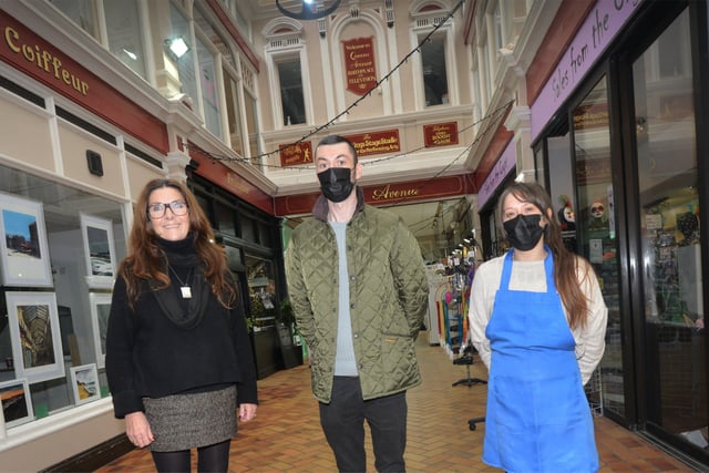 Queens Arcade in Hastings: L-R Suzie Mitchell, Natural Skin Care Deli, and co-owners of Rainbows Sweet Shop Thomas Woodley and Natalie Hayden. SUS-220124-131006001