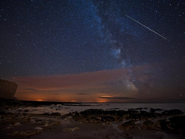 Dark skies over Birling Gap by Les Hunt SUS-220702-090934001