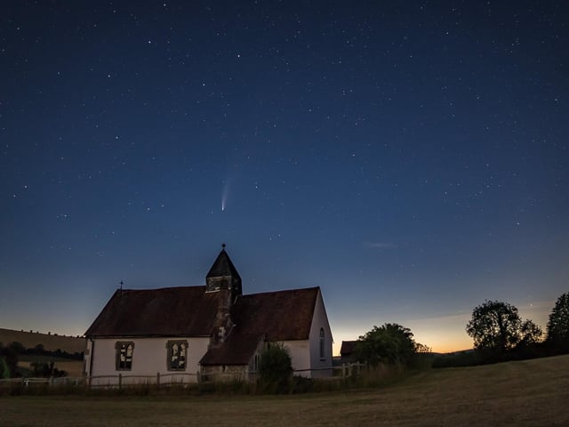 The night sky over church on the South Downs by Paul Rogers SUS-220702-091125001