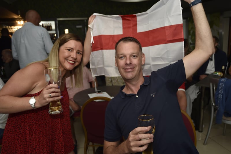 England football fans watching the Ukraine game at the Willows Cafe Bar at Central park EMN-210307-221157009