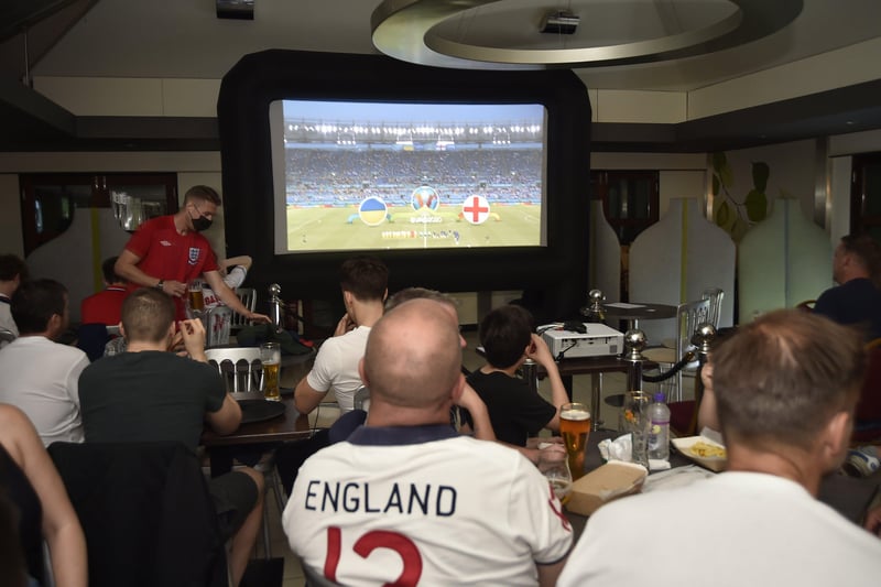England football fans watching the Ukraine game at the Willows Cafe Bar at Central park EMN-210307-221241009