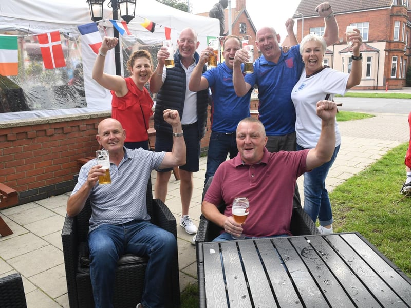 Ready to cheer on England at Churchills Wine & Sports Bar are (from left, front) Andrew Storr and Jason Curry: (from back) Dawn and Steve Radford, Dan Meik, John Miles and Annette Monaghan.