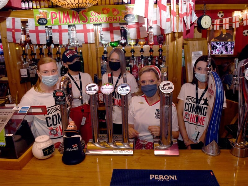 Bar staff at Churchills Wine & Sports Bar in Skegness.