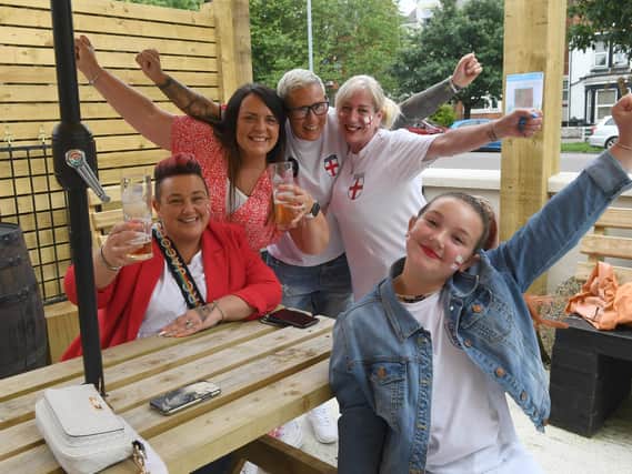 Cheering on England at the New Park Club in Skegness are (from left) Amanda Dryhurst, Deb Green, Andria Marsden, Jo Smit and, Lacey-Rae Dryhurst 10.