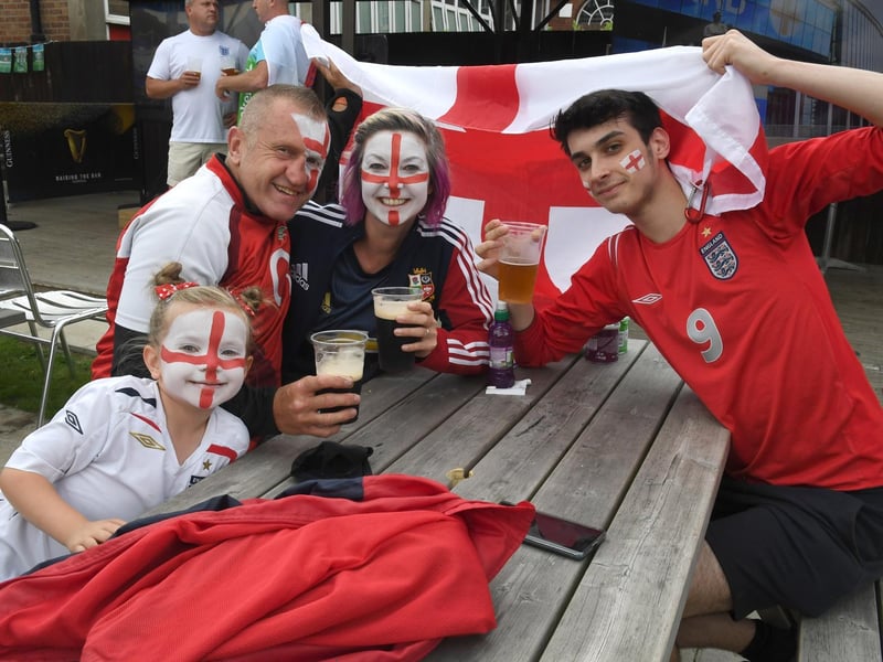 Enjoying the fun of the final at the Lumley Bar-Restaurant in Skegness are (from left) Grace Divilly 6, Jason Divilly, Katy Divilly and George Meadows