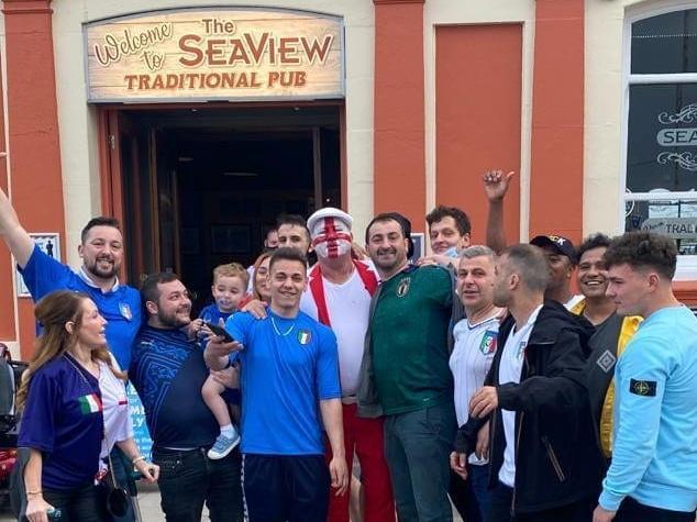 Members of Skegness' Italian community celebrating the final in Skegness.