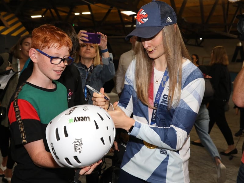 Signing autographs