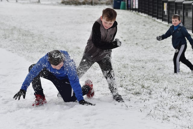 Brothers Olly , Charlie and Brody  playing in the snow in Crumlin Co Antrim