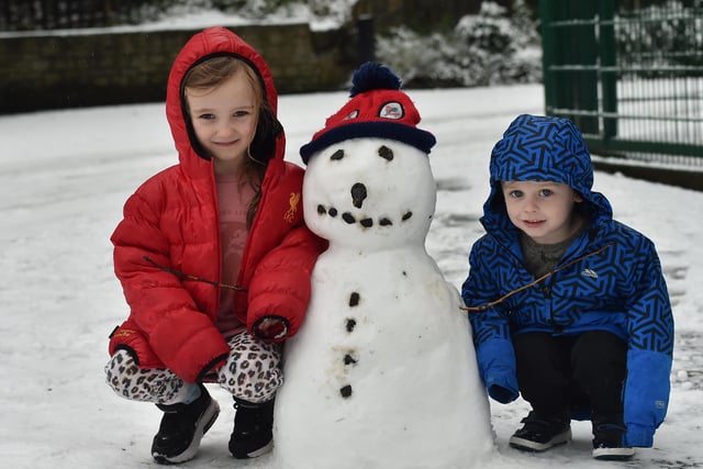 Children make a snow man   in Crumlin Co Antrim