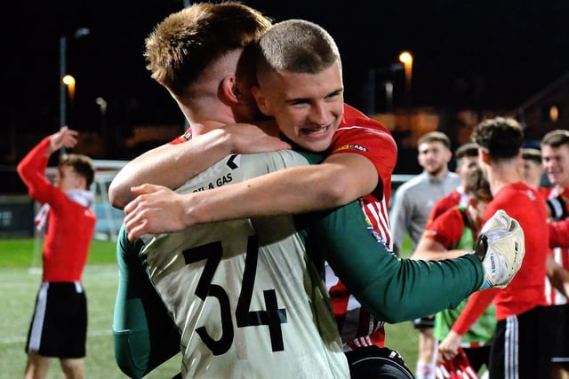 Derry City’s Caoimhin Porter celebrates with goalkeeper Raudhan McKenna after winning the EA Sports U19 Enda McGuill Cup. Picture: George Sweeney.  DER2143GS - 081