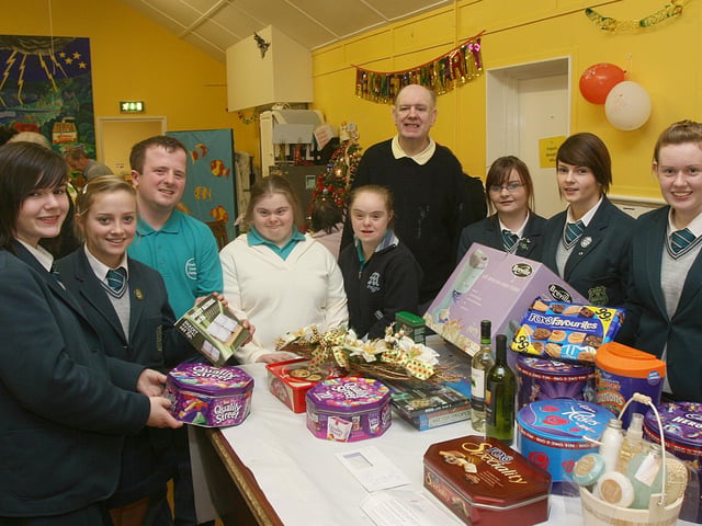 Thornhill College students helping with the stalls at the Christmas Craft Fare at the Richmond Hall, organised by Praxis Care Group. From left are Brogan Mallett, Hayley McIntyre, Emma Doherty, Cara Duddy and Hollie Cassidy. Included are James Norris, Clare Tutor, Amanda Dylon and Michael Gallagher. (1512T03).