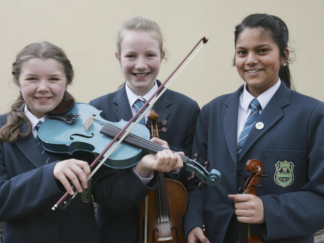 Thornhill College students who won the String Trio at feis Dhoire Cholmcille. From left are Sorcha Carlin, Ciana Darrell and Gargi Pandey. (2804C19)