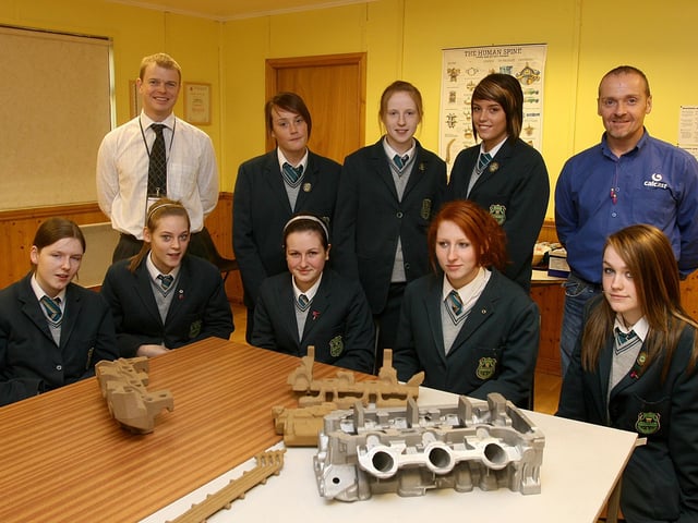Year 12 and Year 13 students from Thornhill College on a visit to Calcast at Maydown. Included is their Physics teacher Nigel Morewood (left) with John Crossan, training office at the plant. LS47-501MT.