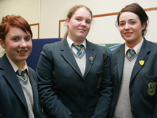 Thornhill College students Clar O'Hara, Cecilia Ni Mhaolain and Nadine Nic Choigain winners of the Irish Debate team at the central library. (0404JB02)