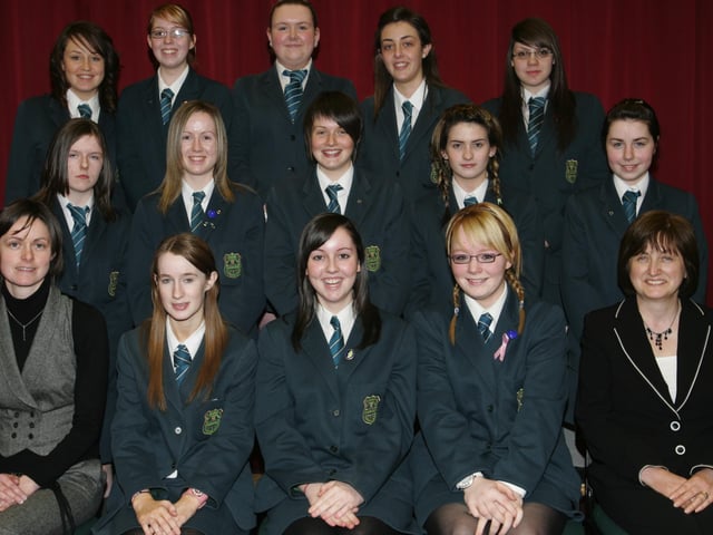 Thornhill College student kathryn Doherty (seated second from right) who aws awarded a Godl certificate in the Intermediate UK Maths Challenge pictured with Matths teachers Sabrina Wade and Amelia McGinnity and students who recieved silver and bronze certificates.  (0704JB25)