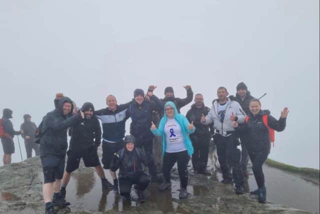 William Green and supporters on top of Ben Lomond.