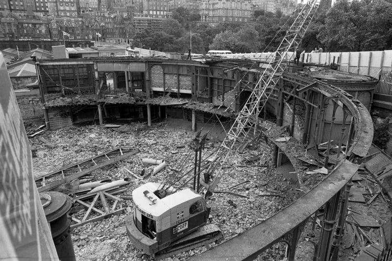 Demolishing the old Waverley Market in Edinburgh in June 1982. The old building housed a fruit and vegetable market, a roof garden and the lower level was used for fairs, circuses, menageries and exhibitions. The Princes Mall shopping centre now stands on the Princes Street site.