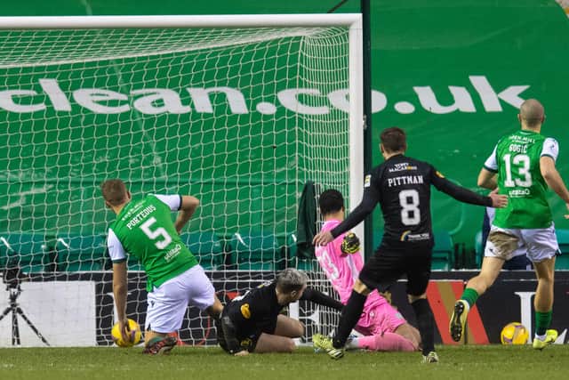 Scott Robinson capitalises on mistakes in the Hibs defence to make it 3-0 to Livingston at Easter Road. (Photo by Ross MacDonald / SNS Group)