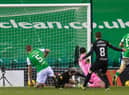Scott Robinson capitalises on mistakes in the Hibs defence to make it 3-0 to Livingston at Easter Road. (Photo by Ross MacDonald / SNS Group)