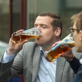 Scottish Tories leader Douglas Ross enjoys a pint at the Edinburgh Brewing Company in Newington. Picture: Lisa Ferguson







SCOTLANDSCOVID RESTRICTIONS MOVE INTO LEVEL 3 TODAY WHICH MEAN PUB AND RESTAURANTS CAN RE-OPEN, WITH ALCOHOL PERMITTED TO BE DRANK OUTSIDE