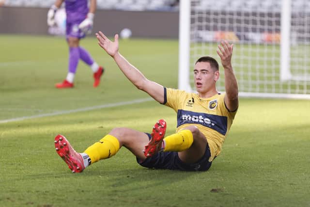 Lewis Miller in action for Central Coast Mariners during an A-League match with Western United