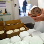 The latest supplies of Camembert are packed in the Normandy village of the same name (Picture: Charly Triballeau/AFP via Getty Images)