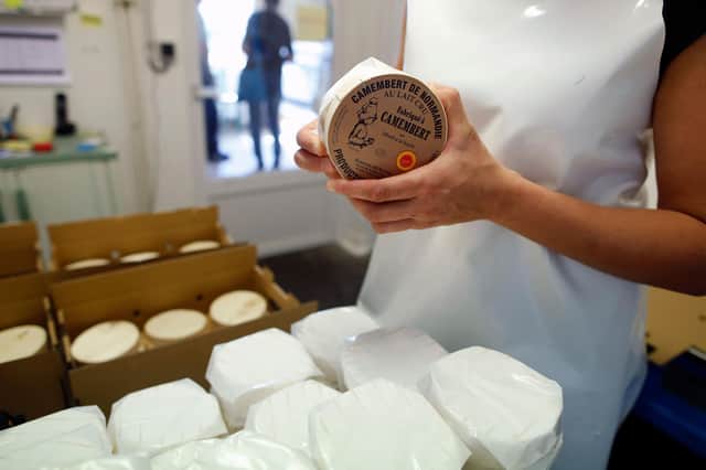 The latest supplies of Camembert are packed in the Normandy village of the same name (Picture: Charly Triballeau/AFP via Getty Images)