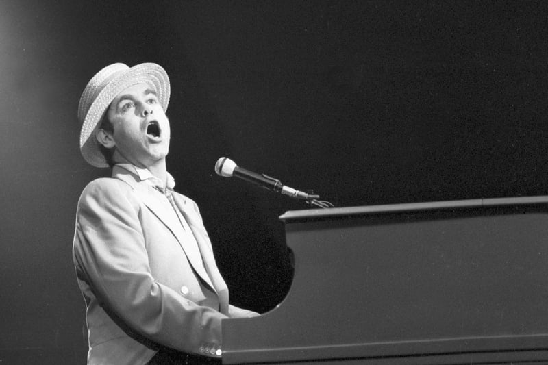 British singer/composer/musician Elton John performed a concert at the Hibs ground in June 2005, with Scottish singer Lulu supporting him. Here he is pictured at the piano on stage at the Playhouse theatre in Edinburgh, June 1984.