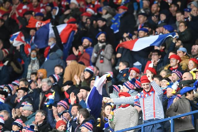 French fans celebrate after their triumph at BT Murrayfield.