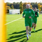David Gray leads the way at training at East Mains. The Hibs captain says he feels as fit as he ever has and hasn't missed one training session