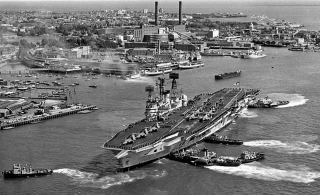 A marvellous photograph from Mike Nolans collection. HMS Ark Royal berthing at South Railway Jetty in 1972.