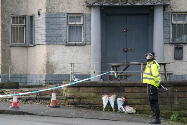 Floral tributes left close to the scene near the Anchor Inn in Granton, Edinburgh, where Marc Webley, aged 38, was killed in a shooting just before midnight on New Year's Eve. Photo: Jane Barlow/PA Wire
