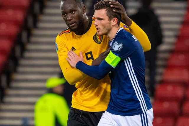 GLASGOW, SCOTLAND - SEPTEMBER 9: Scotland's Andy Robertson is consoled by Romelu Lukaku at full time during a UEFA Euro 2020 qualifier between Scotland and Belgium, at Hampden Park, on September 9, 2019, in Glasgow, Scotland. (Photo by Alan Harvey / SNS Group)