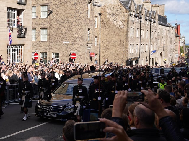King Charles III and members of the royal family join the procession of Queen Elizabeth's coffin from the Palace of Holyroodhouse to St Giles' Cathedral, Edinburgh.Picture date: Monday September 12, 2022.